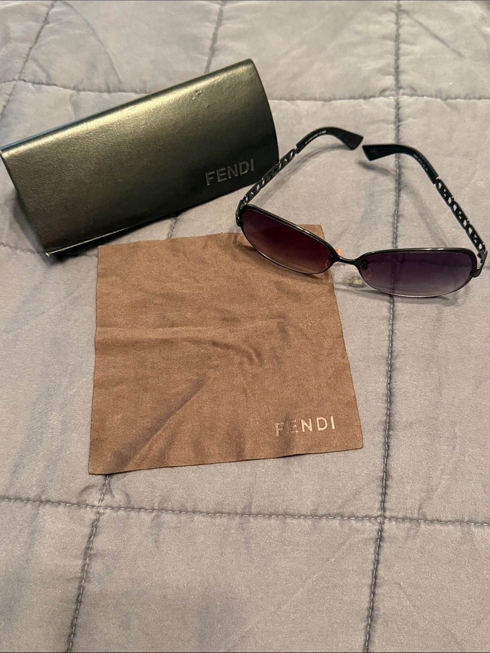 Fendi Black Frame Sunglasses with Purple Lenses